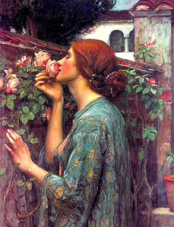 девушка вдыхающая аромат розы